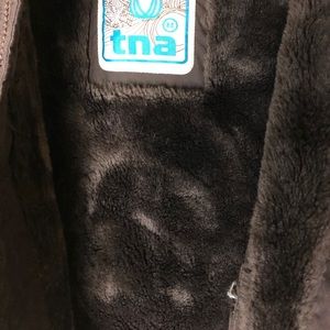TNA coat